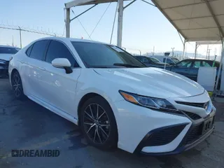 2023 Toyota Camry SE with VIN 4T1G11AK2PU799683, listed as a IAAI auction lot 41969271 with 32,332 mi miles and . Bid and sale history available at DreamBid. Image 1.