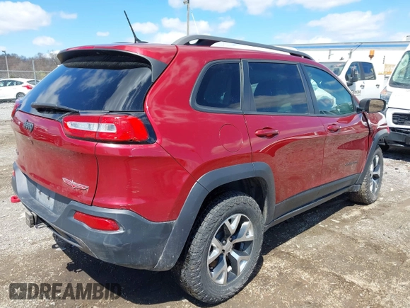 2015 Jeep Cherokee Trailhawk with VIN 1C4PJMBS0FW728361, listed as a IAAI auction lot 41978853 with 123,127 mi miles. Bid and sale history available at carsss.com. Image 4.