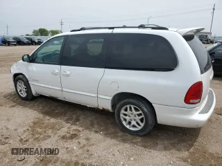 2000 Dodge Caravan SE with VIN 1B4GP44G7YB636078, listed as a Copart auction lot 59387395 with 184,916 mi miles and Salvage title. Bid and sale history available at DreamBid. Image 2.