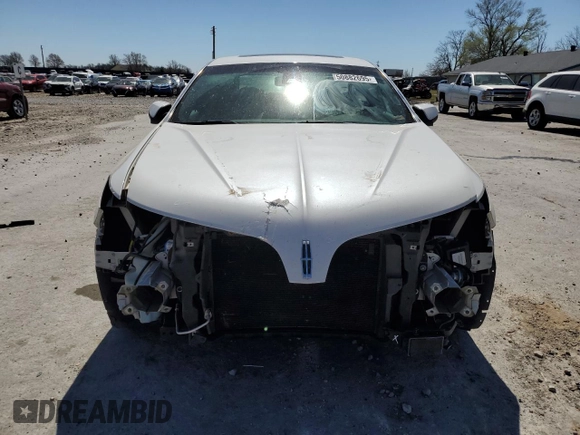 2015 Lincoln MKS с VIN 1LNHL9DK7FG605218, выставлен на аукционе Copart как лот 50882695 с пробегом 160 907 миль миль и Списание • Salvage title. История ставок и продаж доступна на DreamBid. Изображение 5.
