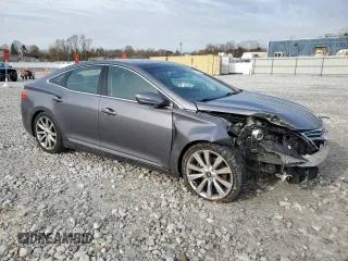 2013 Hyundai Azera with VIN KMHFH4JG4DA317104, listed as a Copart auction lot 52909875 with 125,485 mi miles and Salvage Title. Bid and sale history available at DreamBid. Image 4.