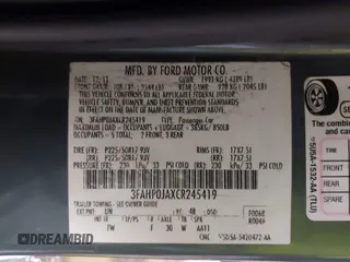 2012 Ford Fusion SEL with VIN 3FAHP0JAXCR245419, listed as a IAAI auction lot 40999897 with 123,085 mi miles and . Bid and sale history available at carsss.com. Image 9.