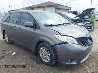 2014 Toyota Sienna XLE with VIN 5TDYK3DC4ES463315, listed as a IAAI auction lot 42108050 with 197,140 mi miles. Bid and sale history available at carsss.com. Image 1.