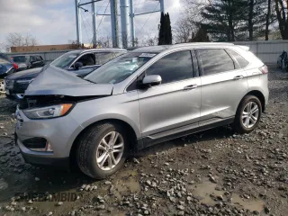 2020 Ford Edge SEL z VIN 2FMPK4J95LBA29912, wystawiony jako Copart lot #82968534 z przebiegiem 104 083 mil mil oraz Szkoda całkowita • Salvage title. Historia ofert i sprzedaży dostępna na DreamBid. Obrazek 1.