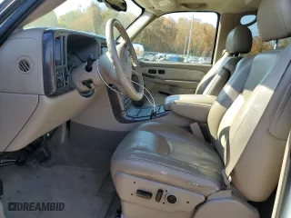 2005 GMC Yukon Denali with VIN 1GKEK63U75J163204, listed as a Copart auction lot 77300834 with 92,096 mi miles and Salvage Title. Bid and sale history available at carsss.com. Image 7.