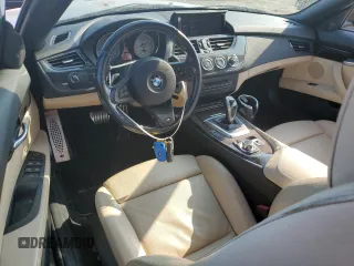 2014 BMW Z4 sDrive35is with VIN WBALM1C57EE634167, listed as a Copart auction lot 69088044 with 68,620 mi miles and Salvage Title. Bid and sale history available at carsss.com. Image 8.
