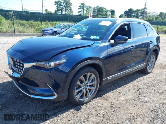 2019 Mazda CX-9 Grand Touring with VIN JM3TCBDY6K0335886, listed as a IAAI auction lot 42704250 with 37,171 mi miles and . Bid and sale history available at DreamBid. Image 21.