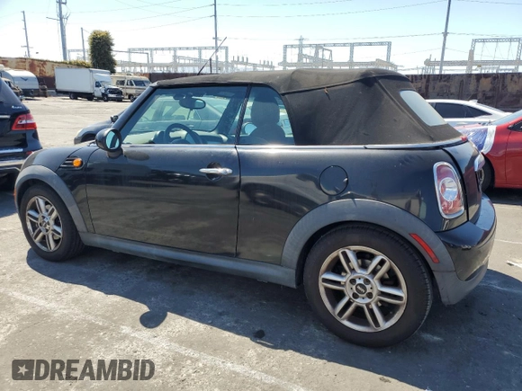 2015 MINI Convertible with VIN WMWZN3C56FT266838, listed as a Copart auction lot 50250745 with 60,331 mi miles and Salvage title. Bid and sale history available at DreamBid. Image 2.