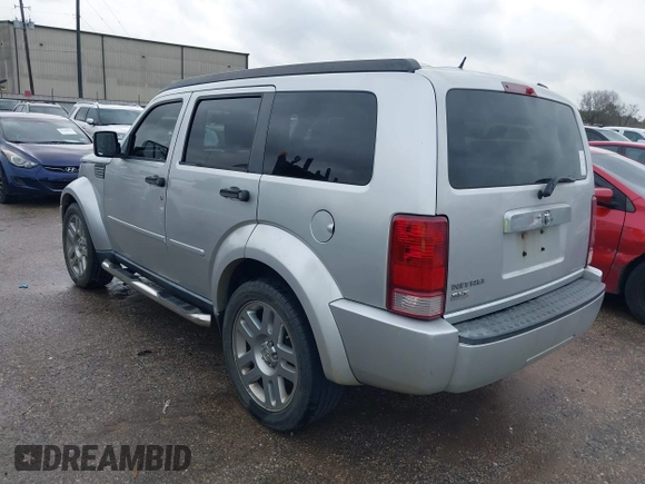 2008 Dodge Nitro SLT with VIN 1D8GT58K58W127412, listed as a IAAI auction lot 41544874 with 232,748 mi miles. Bid and sale history available at carsss.com. Image 3.