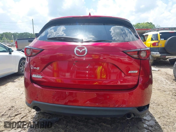 2018 Mazda CX-5 Grand Touring with VIN JM3KFADM4J0335913, listed as a IAAI auction lot 42326044 with 104,583 mi miles and . Bid and sale history available at DreamBid. Image 17.