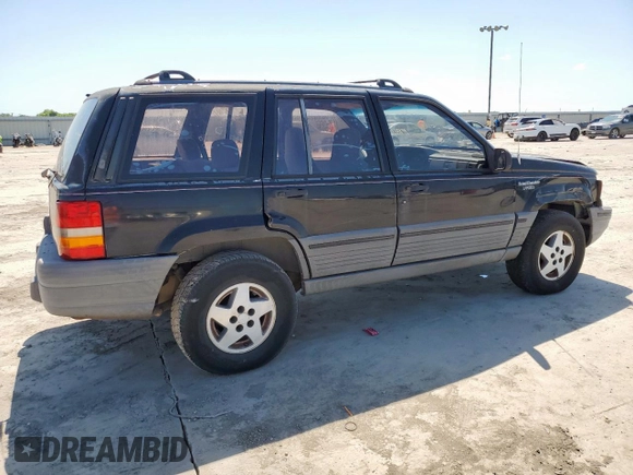1995 Jeep Grand Cherokee Laredo z VIN 1J4FX58S9SC534442, wystawiony jako Copart lot #61233725 z przebiegiem 363 688 mil mil oraz Szkoda całkowita • Salvage title. Historia ofert i sprzedaży dostępna na DreamBid. Obrazek 3.