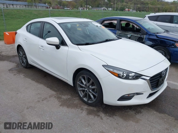 2018 Mazda 3 Touring with VIN 3MZBN1V32JM190611, listed as a IAAI auction lot 42032844 with 63,493 mi miles and . Bid and sale history available at DreamBid. Image 1.