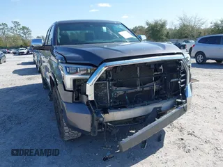 2022 Toyota Tundra 1794 Edition with VIN 5TFMA5DB9NX015571, listed as a IAAI auction lot 41730283 with 76,429 mi miles and . Bid and sale history available at DreamBid. Image 6.