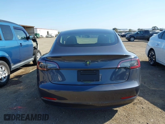 2023 Tesla Model 3 with VIN 5YJ3E1EA7PF447409, listed as a IAAI auction lot 41965416 with 40,033 mi miles and . Bid and sale history available at DreamBid. Image 16.