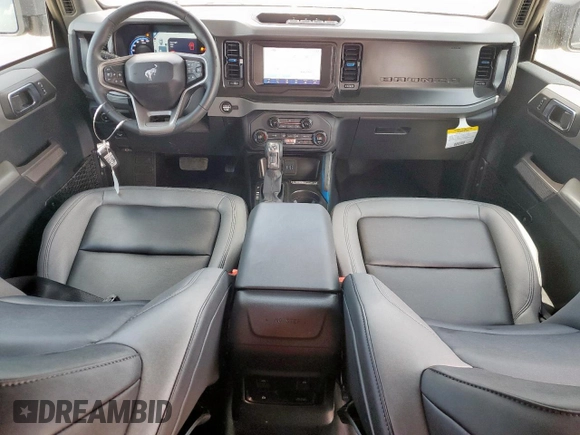 2023 Ford Bronco z VIN 1FMDE5BH0PLB83665, wystawiony jako Copart lot #60420145 z przebiegiem 16 678 mil mil oraz Czysty tytuł • Clean title. Historia ofert i sprzedaży dostępna na DreamBid. Obrazek 8.