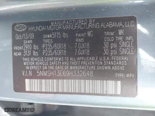 2009 Hyundai Santa Fe SE with VIN 5NMSH13E69H332648, listed as a IAAI auction lot 41948343 with 164,653 mi miles. Bid and sale history available at carsss.com. Image 9.