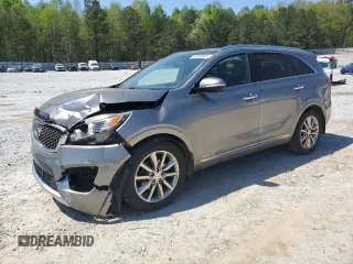 2017 Kia Sorento SX with VIN 5XYPKDA58HG256631, listed as a Copart auction lot 52096685 with 128,660 mi miles and Salvage title. Bid and sale history available at DreamBid. Image 1.