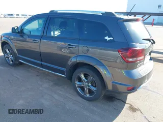 2016 Dodge Journey Crossroad Plus z VIN 3C4PDDGGXGT135934, wystawiony jako IAAI lot #41976026 z przebiegiem 141 181 mil mil oraz . Historia ofert i sprzedaży dostępna na DreamBid. Obrazek 3.
