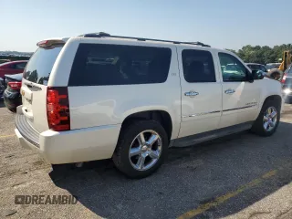 2013 Chevrolet Suburban LTZ with VIN 1GNSCKE03DR104530, listed as a Copart auction lot 74923234 with 230,803 mi miles and Clean Title. Bid and sale history available at carsss.com. Image 3.