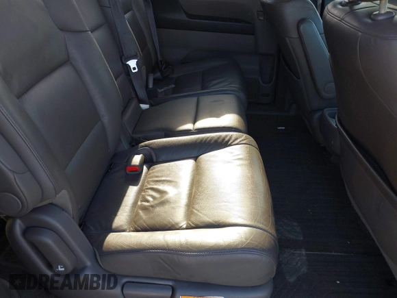 2012 Honda Odyssey EX-L with VIN 5FNRL5H6XCB016801, listed as a IAAI auction lot 42112141 with 164,671 mi miles and . Bid and sale history available at carsss.com. Image 8.