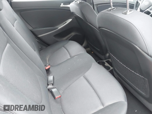 2015 Hyundai Accent Sport with VIN KMHCU5AE3FU205849, listed as a IAAI auction lot 41827093 with 112,980 mi miles. Bid and sale history available at carsss.com. Image 8.