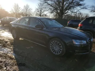 2015 Audi A8 z VIN WAUJGAFD4FN028750, wystawiony jako Copart lot #89099265 z przebiegiem 44 149 mil mil oraz Szkoda całkowita • Salvage title. Historia ofert i sprzedaży dostępna na DreamBid. Obrazek 4.