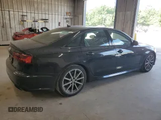 2016 Audi A6 Prestige with VIN WAUHGAFC2GN001442, listed as a Copart auction lot 61633805 with 128,140 mi miles and Salvage title. Bid and sale history available at DreamBid. Image 3.