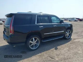 2017 Cadillac Escalade z VIN 1GYS3AKJ4HR338806, wystawiony jako IAAI lot #41941193 z przebiegiem 119 865 mil mil oraz . Historia ofert i sprzedaży dostępna na DreamBid. Obrazek 4.