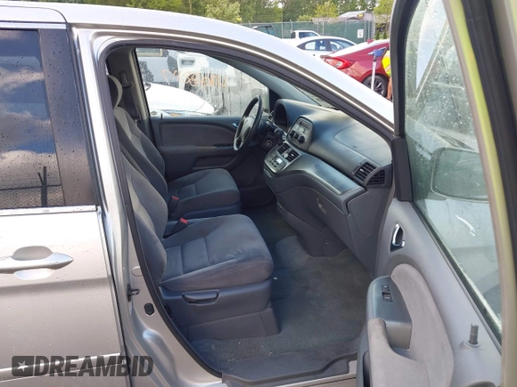 2006 Honda Odyssey EX z VIN 5FNRL38406B403736, wystawiony jako IAAI lot #42288117 z przebiegiem 159 686 mil mil oraz . Historia ofert i sprzedaży dostępna na DreamBid. Obrazek 5.