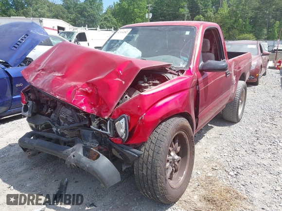 2001 Toyota Tacoma with VIN 5TENL42N01Z771234, listed as a IAAI auction lot 42314202 with 144,000 mi miles and . Bid and sale history available at DreamBid. Image 2.