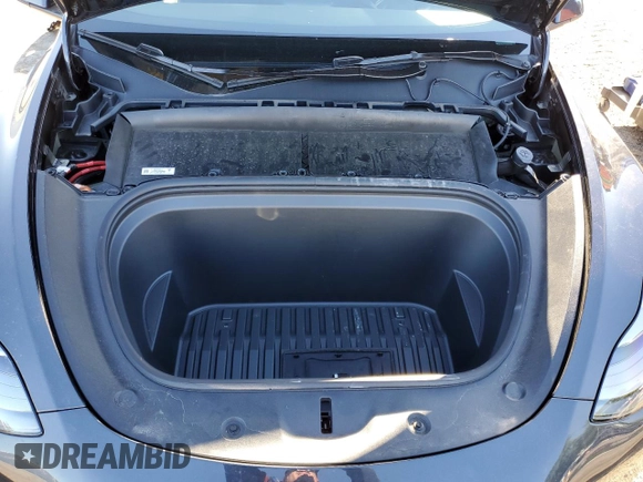 2024 Tesla Model Y with VIN 7SAYGDED3RF151031, listed as a Copart auction lot 49494165 with 7,503 mi miles and Salvage Title. Bid and sale history available at DreamBid. Image 13.