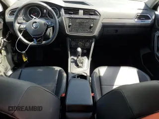 2021 Volkswagen Tiguan SE z VIN 3VV3B7AX7MM118689, wystawiony jako Copart lot #53640205 z przebiegiem 68 737 mil mil oraz Szkody całkowita. Historia ofert i sprzedaży dostępna na DreamBid. Obrazek 8.