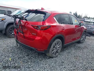 2021 Mazda CX-5 Grand Touring with VIN JM3KFBDM4M1455540, listed as a IAAI auction lot 41937166 with 1 mi miles. Bid and sale history available at carsss.com. Image 4.