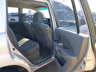 2006 Honda Pilot LX with VIN 2HKYF18156H556689, listed as a IAAI auction lot 40792236 with 273,856 mi miles. Bid and sale history available at carsss.com. Image 8.