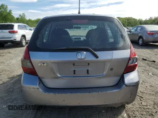 2007 Honda Fit z VIN JHMGD37427S059531, wystawiony jako Copart lot #57025775 z przebiegiem 224 576 mil mil oraz Czysty tytuł • Clean title. Historia ofert i sprzedaży dostępna na DreamBid. Obrazek 6.