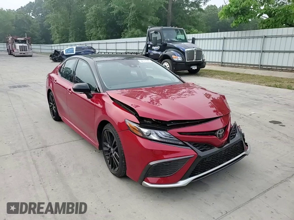 2021 Toyota Camry XSE z VIN 4T1K61AK4MU495780, wystawiony jako Copart lot #54576745 z przebiegiem 24 603 mil mil oraz Szkoda całkowita • Salvage title. Historia ofert i sprzedaży dostępna na DreamBid. Obrazek 13.