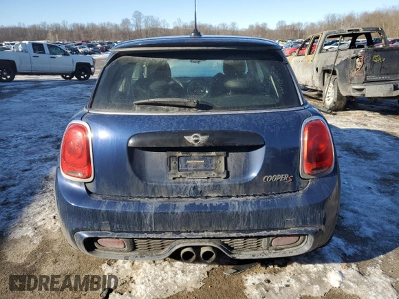 2014 MINI Hardtop S with VIN WMWXM7C51ET986340, listed as a Copart auction lot 42390825 with 71,558 mi miles and Salvage Title. Bid and sale history available at DreamBid. Image 6.