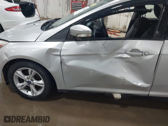 2014 Ford Focus SE with VIN 1FADP3K28EL424177, listed as a IAAI auction lot 41677768 with 104,279 mi miles. Bid and sale history available at carsss.com. Image 6.