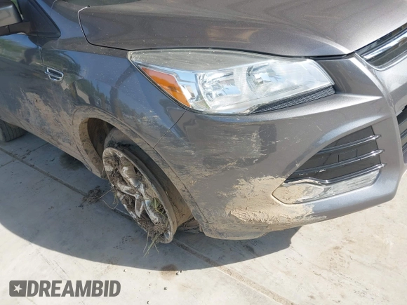 2014 Ford Escape Titanium with VIN 1FMCU9JX0EUC45801, listed as a IAAI auction lot 42121561 with 80,217 mi miles and . Bid and sale history available at DreamBid. Image 6.