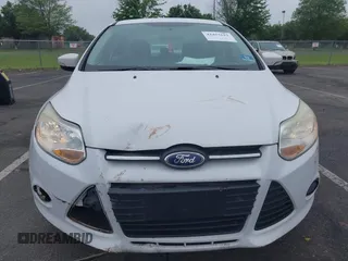 2013 Ford Focus SE with VIN 1FADP3F29DL306051, listed as a IAAI auction lot 42457611 with 86,817 mi miles and . Bid and sale history available at DreamBid. Image 6.
