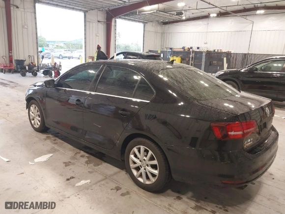 2017 Volkswagen Jetta 1.4T SE with VIN 3VWB67AJ4HM303036, listed as a IAAI auction lot 41394388 with 89,070 mi miles. Bid and sale history available at carsss.com. Image 3.