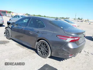 2019 Toyota Camry XSE with VIN 4T1B61HK3KU770042, listed as a IAAI auction lot 41840898 with 101,957 mi miles. Bid and sale history available at carsss.com. Image 3.