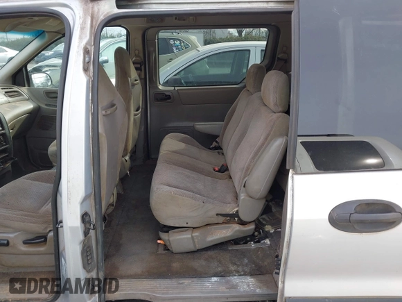 2002 Ford Windstar LX z VIN 2FMZA51482BA86819, wystawiony jako IAAI lot #41395576 z przebiegiem 115 762 mil mil oraz . Historia ofert i sprzedaży dostępna na DreamBid. Obrazek 8.