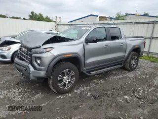 2023 GMC Canyon 4WD AT4 with VIN 1GTP6DEK4P1124937, listed as a Copart auction lot 66103474 with 10,566 mi miles and Salvage Title. Bid and sale history available at carsss.com. Image 1.