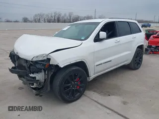 2018 Jeep Grand Cherokee Laredo E with VIN 1C4RJEAG0JC218694, listed as a IAAI auction lot 41587665 with 97,618 mi miles. Bid and sale history available at carsss.com. Image 17.