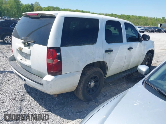 2010 Chevrolet Tahoe LS with VIN 1GNMCAE05AR263340, listed as a IAAI auction lot 41998453 with 256,944 mi miles and . Bid and sale history available at DreamBid. Image 4.