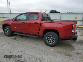 2021 GMC Canyon 4WD AT4 w/Cloth with VIN 1GTG6FENXM1185842, listed as a Copart auction lot 52574755 with 47,322 mi miles and Salvage Title. Bid and sale history available at carsss.com. Image 2.