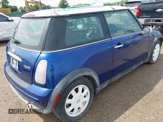 2004 MINI Hardtop with VIN WMWRC33474TJ60134, listed as a IAAI auction lot 42389410 with 183,452 mi miles and . Bid and sale history available at DreamBid. Image 4.