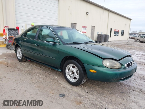 1999 Mercury Sable GS with VIN 1MEFM50U5XG633589, listed as a IAAI auction lot 41614442 with 241,833 mi miles. Bid and sale history available at carsss.com. Image 1.
