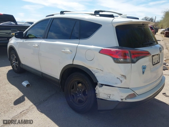 2017 Toyota RAV4 LE with VIN JTMZFREV0HJ116626, listed as a IAAI auction lot 41809294 with 110,114 mi miles. Bid and sale history available at carsss.com. Image 3.